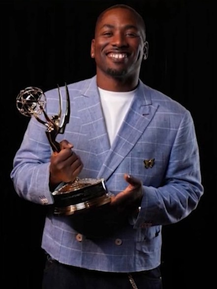 James &ldquo;JJ88&rdquo; Jacobs holding his Emmy